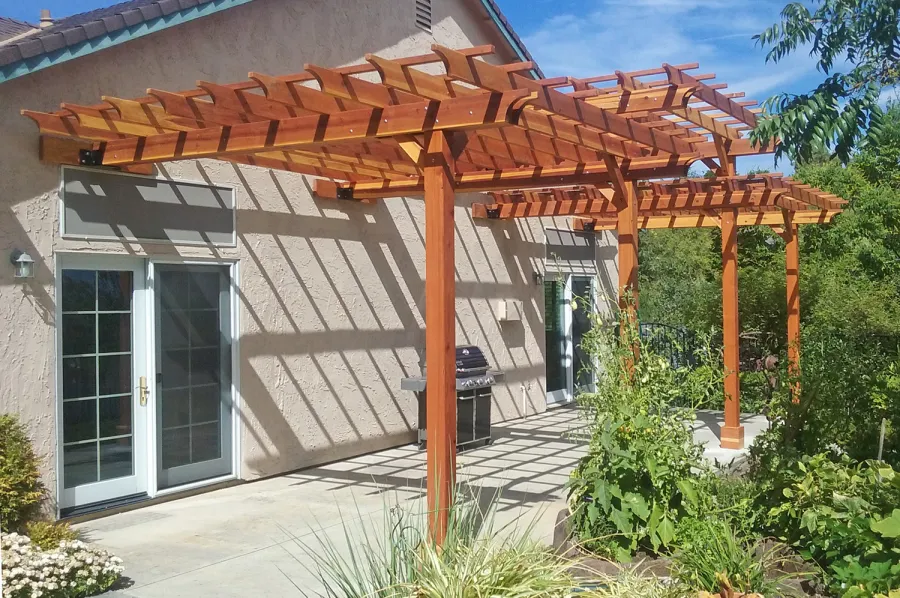 Custom Wooden Pergola (Options: 35' L, 13' W, California Redwood, No Electrical Wiring Trim, 4-Post Anchor Kit for Concrete, No Privacy Panels, No Curtain Rods, 10' & 11' Post Height, Transparent Premium Sealant). Photo Courtesy of D. Drake of Auburn, CA.