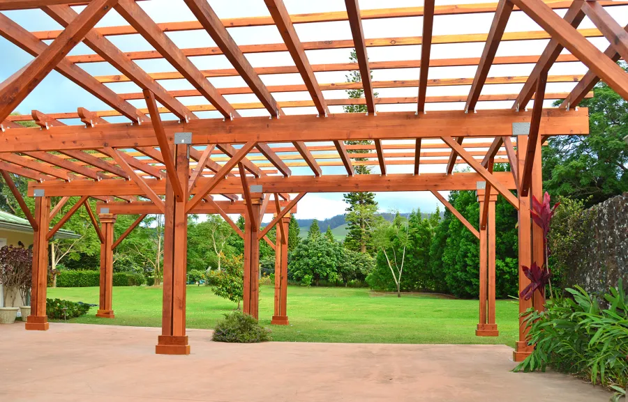 Custom Wooden Pergola (Options: 39' x 50', Mature Redwood, 3 1/8" x 15" Glulam Beams/Supports, 3 3/4" x 7 1/4" Rafters and 1 3/4" x 3 3/4" Slats, Double 5 /12" x 5 1/2" x 10' Posts, Custom Post Anchors, Transparent Premium Sealant). Photo Courtesy of D. Cole of Maui, Hawaii.