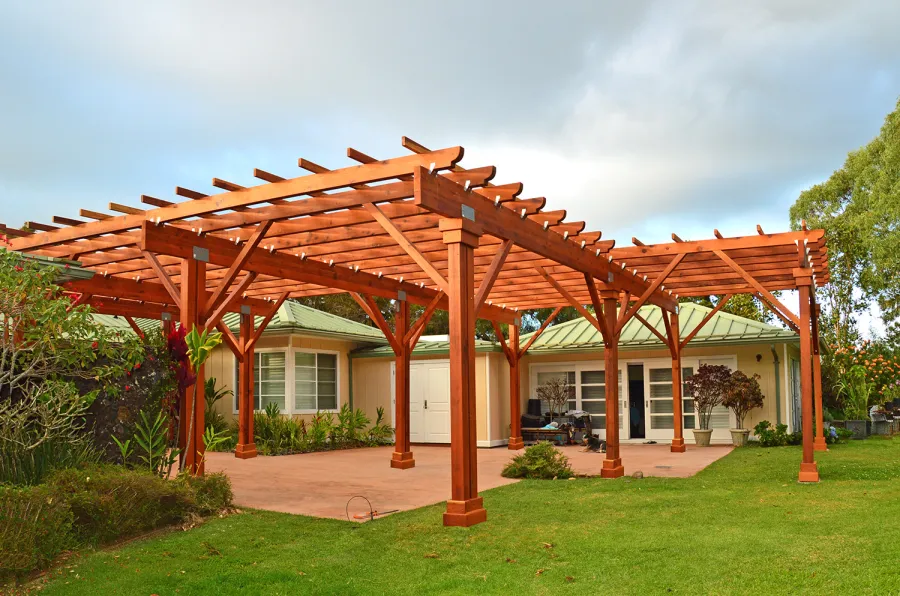 Custom Wooden Pergola (Options: 39' x 50', Mature Redwood, 3 1/8" x 15" Glulam Beams/Supports, 3 3/4" x 7 1/4" Rafters and 1 3/4" x 3 3/4" Slats, Double 5 /12" x 5 1/2" x 10' Posts, Custom Post Anchors, Transparent Premium Sealant). Photo Courtesy of D. Cole of Maui, Hawaii.