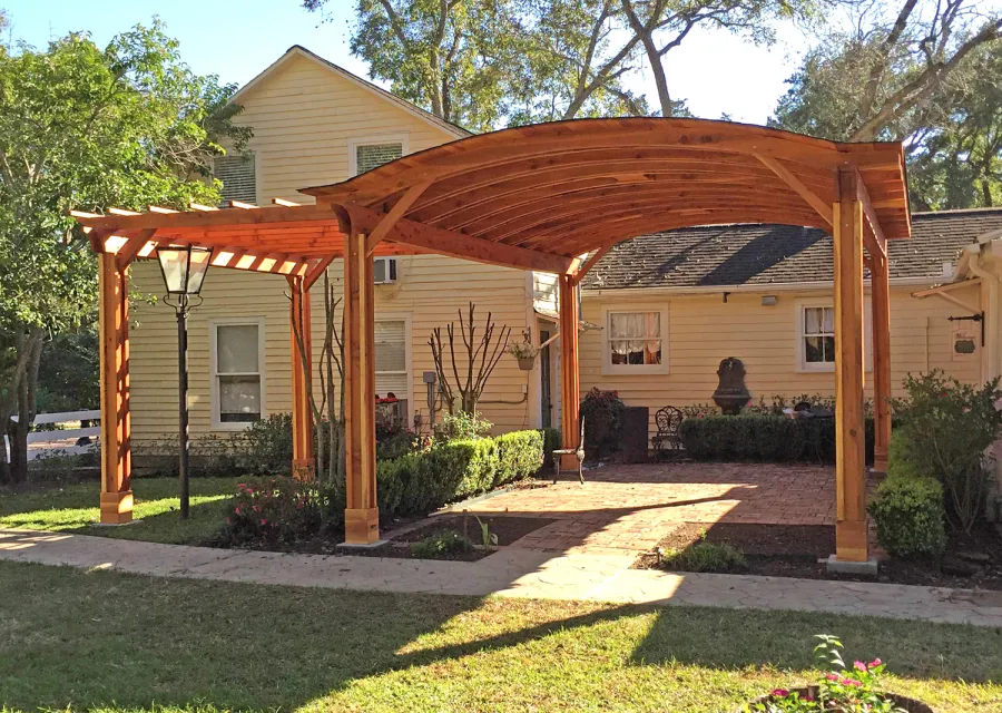 Custom Garden Pergola Attached to a Backyard Pavilion (Options:10' L x 15' W [Pavilion Size is 24' L x 16' Arc W], California Redwood, Unattached, 2 Post Electrical Wiring Trim, 6-Post Anchor Kit for High-Wind, With 2 Ceiling Fan Bases on Pavilion, No Privacy Panels, No Curtain Rods, 10 ft Post Height, Transparent Premium Sealant). Photo Courtesy of Jeff A. of San Ramon, CA.