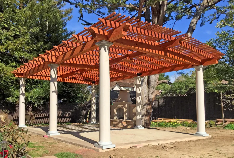 Custom Wooden Pergola (Options: 19' x 32', Mature Redwood, 4-Post Anchor Kit for High-Wind, Trasnparent Premium Sealant). Customer Placed Tuscan Columns Around the Pergola Posts. Photo Courtesy of M. McCook of San Mateo, CA.