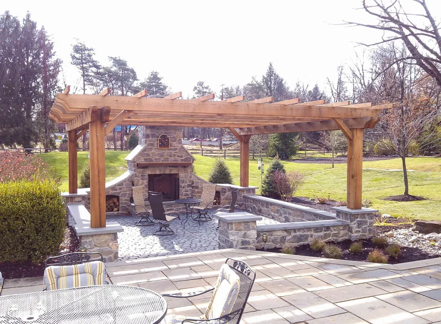 Custom Wooden Fat Timber Pergola (Options: 22' x 20', Mature Redwood, Open Roof with Slats at 24", 4" x 10" Rafters, Lengthwise Roof Support Timbers, 10" x 10" Posts, Bandsaw Finish). Photo Courtesy of Mike Rhoads.