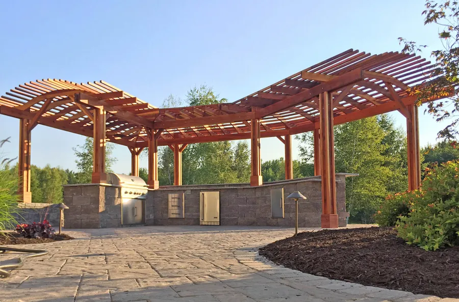 Custom Wooden Pergola (Options: 33' L, 11'-6" W, California Redwood, 1 Electrical Wiring Trim, 10-Post Anchor Kit for Concrete, No Privacy Panels, No Curtain Rods, 9' Post Height, Transparent Premium Sealant). Photo Courtesy of D. Pollock of Baldwinsville, NY.