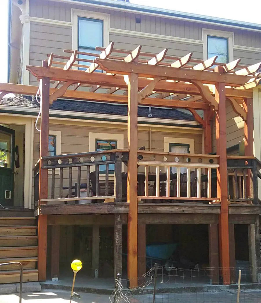 Custom Garden Pergola (Options: 18' L x 13' W, California Redwood, Open Roof with Slats at 18" Rafters at 18" Roof Support Timbers, 6-Post Anchor Kit for Concrete, No Ceiling Fan Base, No Privacy Panels, No Curtain Rods, Custom 14' Post Height, Transparent Premium Sealant). Photo Courtesy of E. Seput of Benicia, CA.