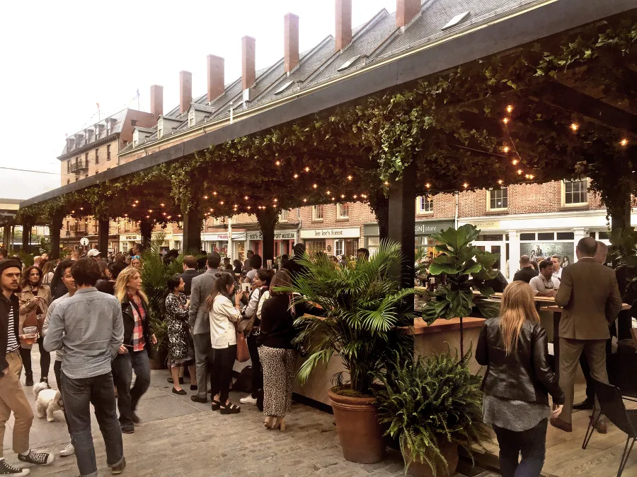 Custom Wooden Pergola (Options: 82' L x 16' W, Douglas-fir, Open Roof with Rafters at 18", with Transparent Rain Guard, 12-Post Anchor Kit, No Ceiling Fan Base, 12' Post Height, Custom Black Paint). This pergola is part of the giant popup beer hall at the Southside Seaport in downtown Manhattan from May to Oct 2017: https://www.timeout.com/newyork/blog/a-giant-pop-up-beer-hall-is-opening-at-south-street-seaport-this-summer-032417