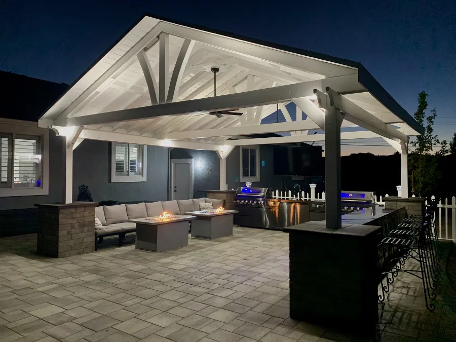 Del Norte Outdoor Kitchen Pavilion (Options: 20' L x 20' W, Douglas-fir, 4-Post Anchor Kit for High-Wind, 2 Fascia Boards, 2 Ceiling Fan Bases, 1 Electrical Wiring Trim Kit, No Post Decorative Trims, Off-White Oil-Based Primer). Photo Courtesy of R. Brooks of Reno, NV.