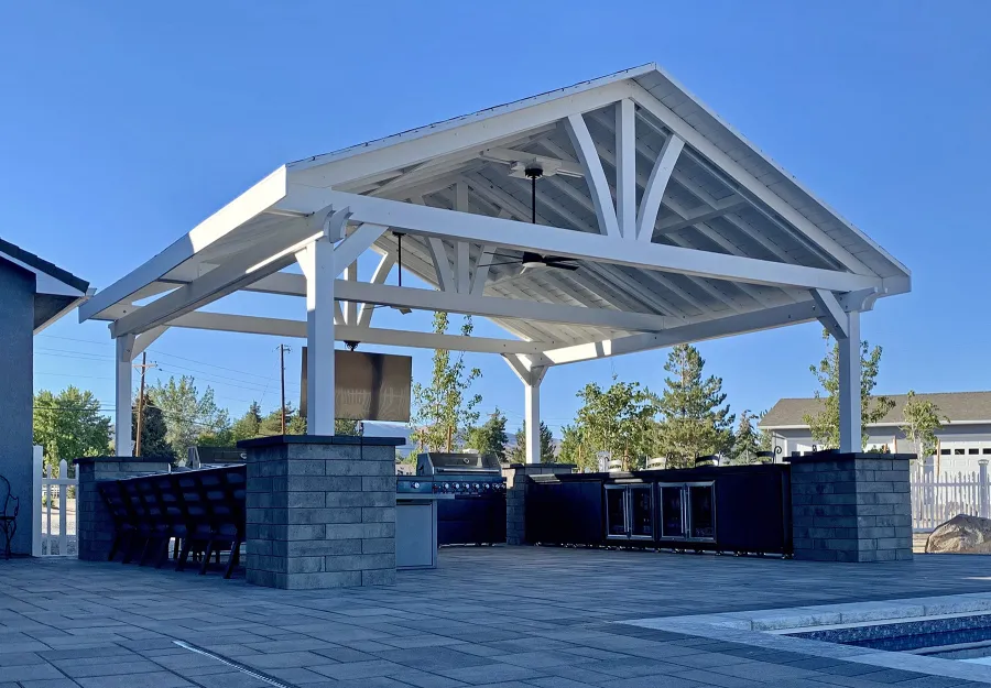 Del Norte Outdoor Kitchen Pavilion (Options: 20' L x 20' W, Douglas-fir, 4-Post Anchor Kit for High-Wind, 2 Fascia Boards, 2 Ceiling Fan Bases, 1 Electrical Wiring Trim Kit, No Post Decorative Trims, Off-White Oil-Based Primer). Photo Courtesy of R. Brooks of Reno, NV.