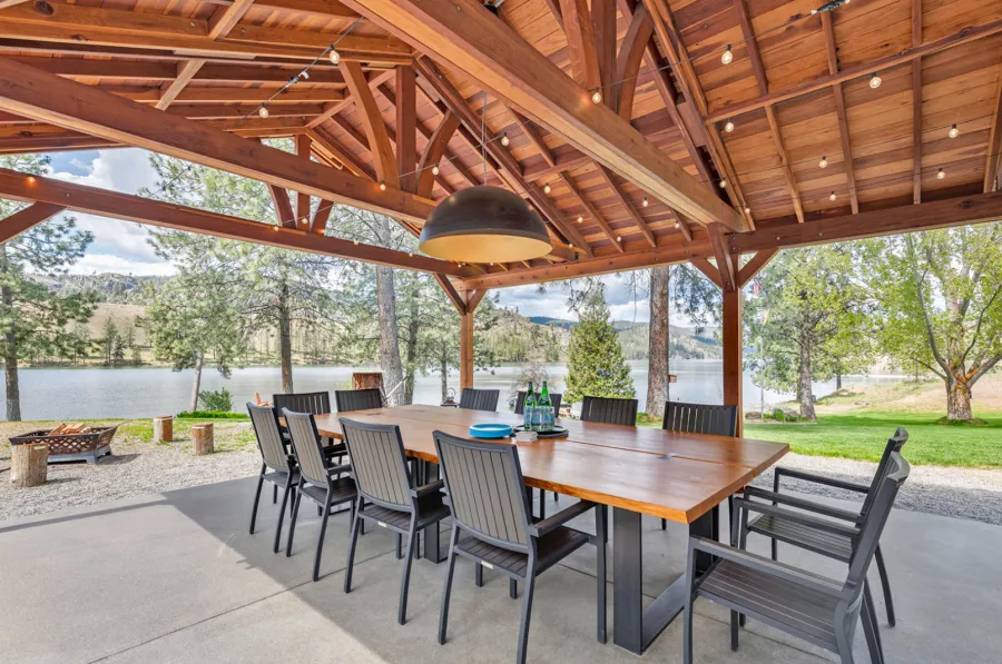 Del Norte Outdoor Kitchen Pavilion (Options: 38.5' L x 18.5' W, California Redwood, No Privacy Panel, Post Anchor Kit for High Wind, 10' H Posts, No Ceiling Fan Base, No Curtain Rod, No Fascia Boards, Transparent Premium Sealant). Photo Courtesy of D. Lemke of Nine Mile Falls, NJ. 