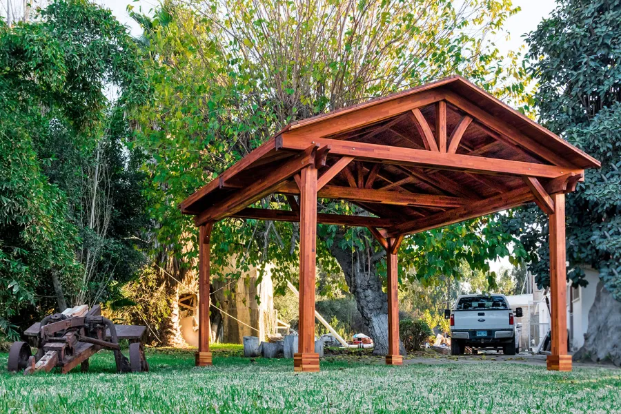 Del Norte Outdoor Kitchen Pavilion (Options: 16' L x 14' W, Mosaic Redwood, 4-Post Anchor Kit for High-Wind, No Ceiling Fan Base, No Electrical Wiring Trim Kit, No Post Decorative Trims, Transparent Premium Sealant). 