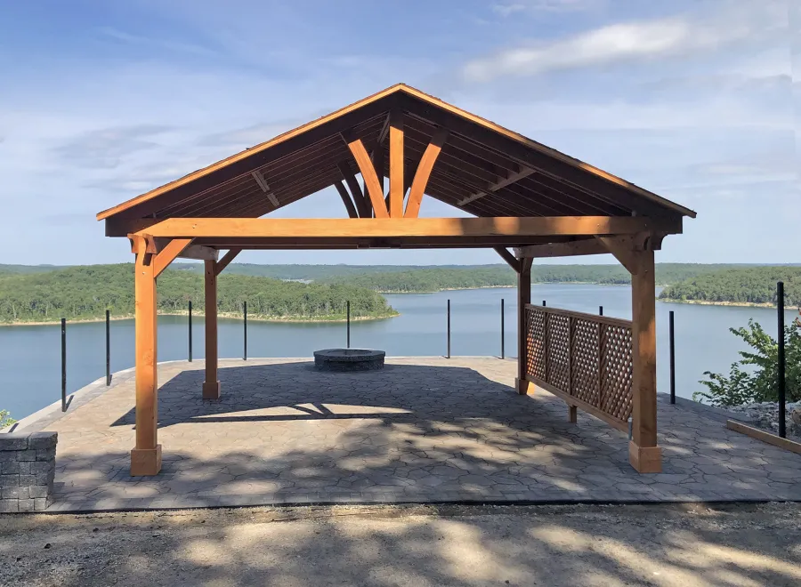 Del Norte Outdoor Kitchen Pavilion (Options: 18' L x 20' W, Douglas-fir, 4-Post Kit for High-Wind, 1 Ceiling Fan Base, 1 Lattice Privacy Panel, 1 Electrical Wiring Trim Kit, No Post Decorative Trims, Transparent Premium Sealant). Photo Courtesy of G. Burris of Elizabeth, AR.