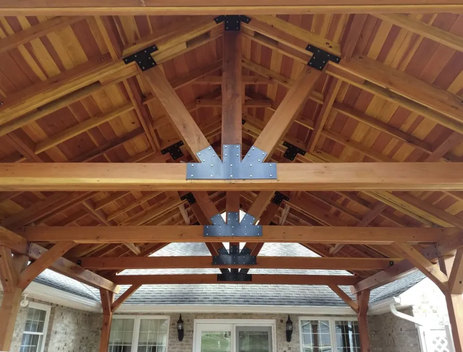 Del Norte Outdoor Kitchen Pavilion (Options: 26' L x 20' W, California Redwood, 6-Post Anchor Kit for High-Wind, Straight Internal Truss Supports by Custom Request, 2 Ceiling Fan Bases, 2 Electrical Wiring Trim Kits, No Post Decorative Trims, Transparent Premium Sealant, with Custom Steel Plating). Roof pitch increased beyond standard amount by customer request. Photo Courtesy of G. Dalby of Knoxville , Tennessee.