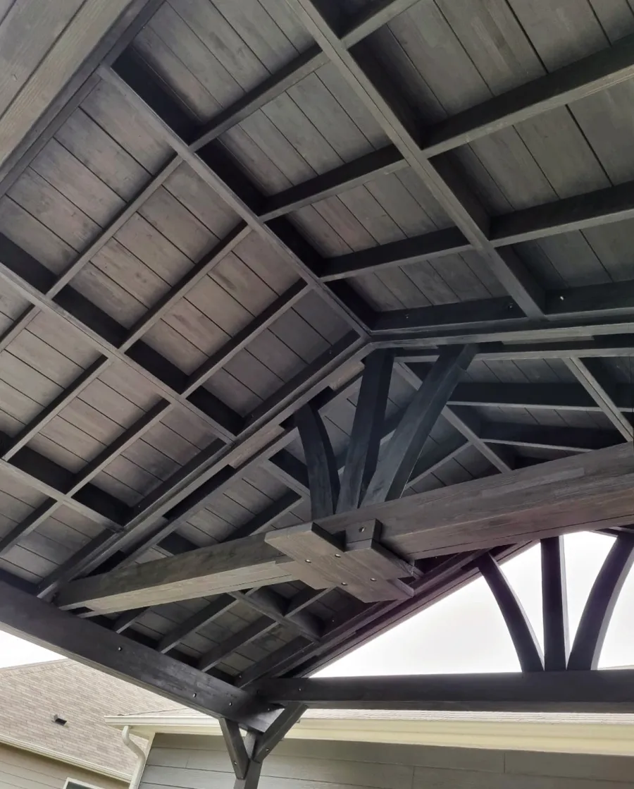 Del Norte Outdoor Kitchen Pavilion (Options: 16' L x 20' W, Mosaic Redwood, No Privacy Panel, 4-Post Anchor Kit for Concrete, 11' H Posts, 1 Ceiling Fan Base, No Curtain Rod, Black Stain Premium Sealant). Photo Courtesy of J. Miller of Brownsburg, Indiana.