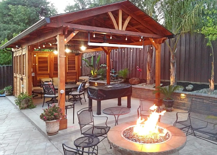 Del Norte Outdoor Kitchen Pavilion (Options: 25' L x 15' W, California Redwood, 6-Post Anchor Kit for Concrete, 4 Ceiling Fan Bases, 2 Electrical Wiring Trim Kits, No Post Decorative Trim, Custom Doors with Louvers & Shutters, Transparent Premium Sealant). Photo Courtesy of J. Gil of San Jose, CA.