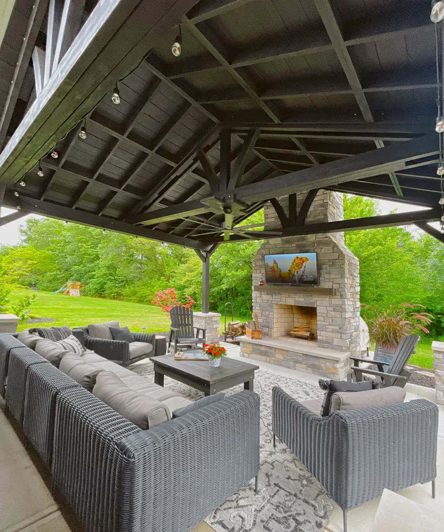Del Norte Outdoor Kitchen Pavilion (Options: 16' L x 20' W, Mosaic Redwood, No Privacy Panel, 4-Post Anchor Kit for Concrete, 11' H Posts, 1 Ceiling Fan Base, No Curtain Rod, Black Stain Premium Sealant). Photo Courtesy of J. Miller of Brownsburg, Indiana.