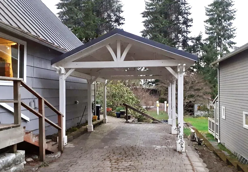 Del Norte Outdoor Kitchen Pavilion (Options: 22' L x 14' W, Mosaic Redwood, 6-Post Anchor Kit for High-Wind, No Ceiling Fan Base, No Electrical Wiring Trim Kit, No Post Decorative Trims, White Primer). Charcoal Gray Metal Roof Installed by Forever Redwood by Custom Request. Photo Courtesy of N. Niekerson of Shoreline, Washington.