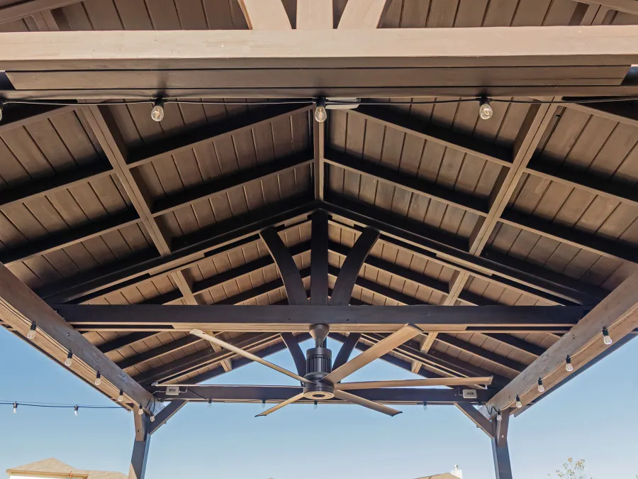 Del Norte Outdoor Kitchen Pavilion (Options: 20' L x 16' W, Mosaic Redwood, 4-Post Kit for Concrete, 1 Ceiling Fan Base, No Electrical Wiring Trim Kit, No Post Decorative Trims, Custom Sealant). Photo Courtesy of S. Oster of Round Rock, TX.