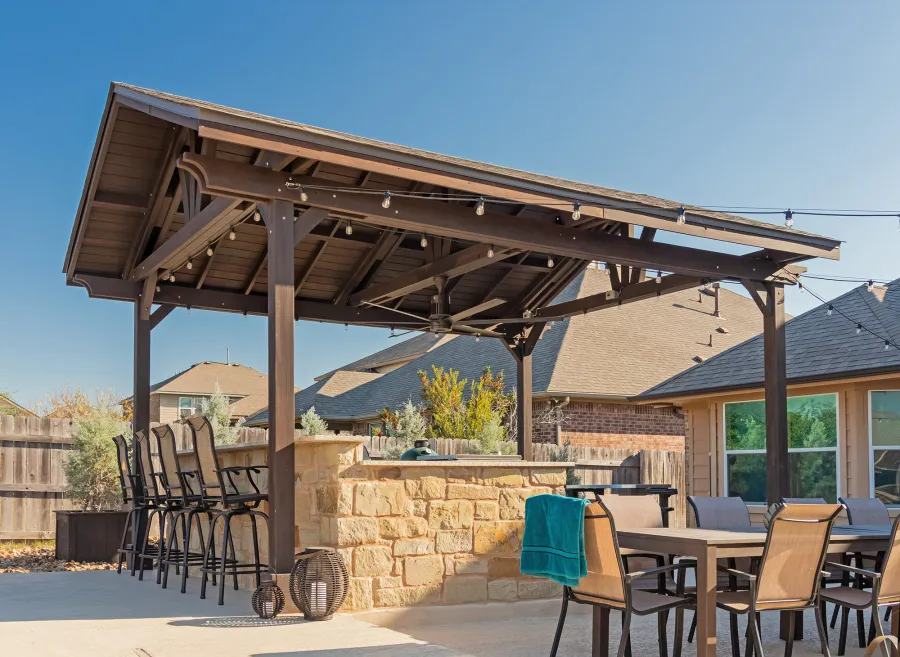 Del Norte Outdoor Kitchen Pavilion (Options: 20' L x 16' W, Mosaic Redwood, 4-Post Kit for Concrete, 1 Ceiling Fan Base, No Electrical Wiring Trim Kit, No Post Decorative Trims, Custom Sealant). Photo Courtesy of S. Oster of Round Rock, TX.