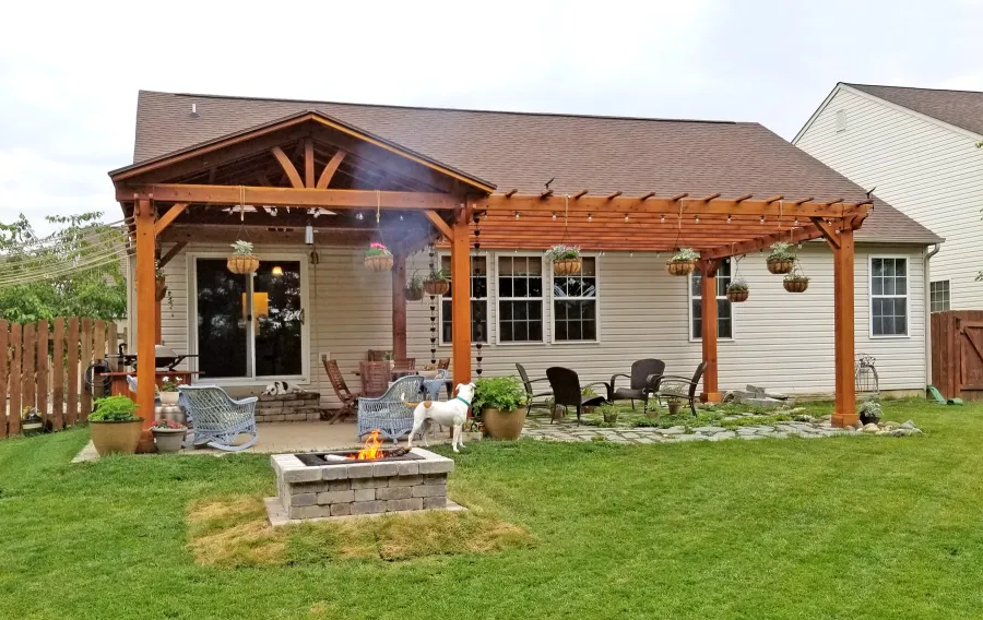 Del Norte Outdoor Kitchen Pavilion (Options: 18' L x 14' W, California Redwood, 6-Post Anchor Kit for High-Wind, No Ceiling Fan Bases, No Electrical Wiring Trim Kits, No Privacy Panels, No Post Decorative Trims, Transparent Premium Sealant). Garden Pergola Attached to the Pavilion. Photo Courtesy of T. Lee of Noblesville, Indiana.