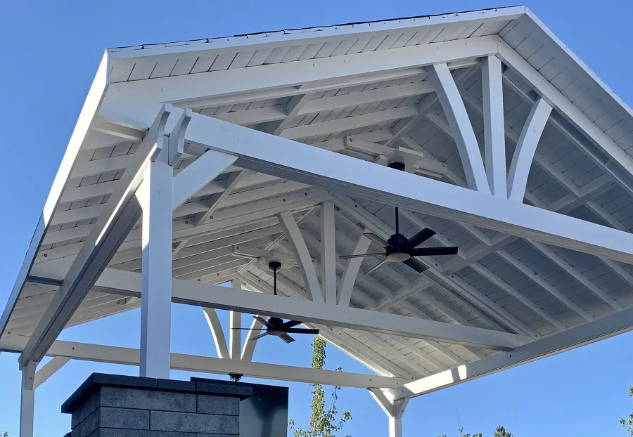 Del Norte Outdoor Kitchen Pavilion (Options: 20' L x 20' W, Douglas-fir, 4-Post Anchor Kit for High-Wind, 2 Fascia Boards, 2 Ceiling Fan Bases, 1 Electrical Wiring Trim Kit, No Post Decorative Trims, Off-White Oil-Based Primer). Photo Courtesy of R. Brooks of Reno, NV.