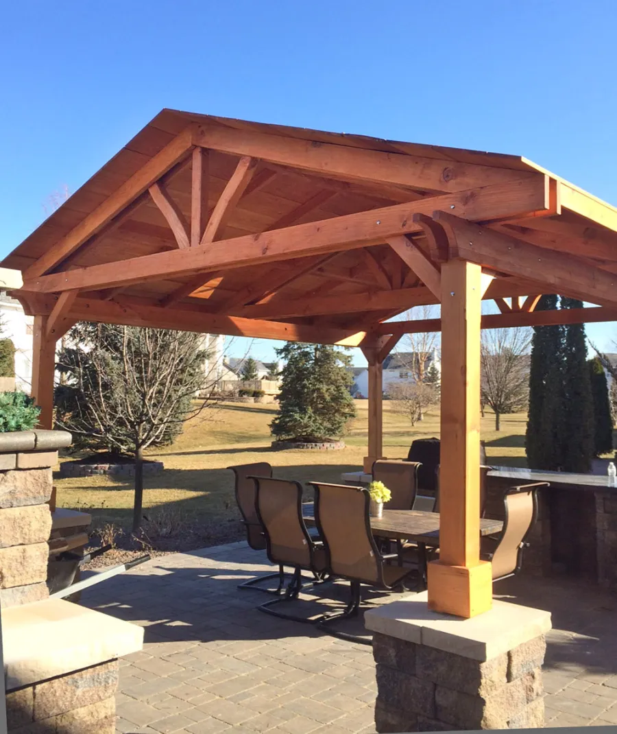 Del Norte Outdoor Kitchen Pavilion (Options: 14' L x 14' W, Douglas-fir, Posts Sitting Atop 33" H Load Bearing Columns, 4-Post Anchor Kit for Concrete, Transparent Premium Sealant). Photo Courtesy of Michael L. of S. Lyon, Michigan.