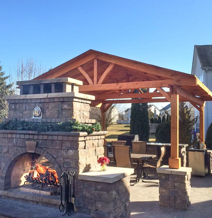 Del Norte Outdoor Kitchen Pavilion (Options: 14' L x 14' W, Douglas-fir, Posts Sitting Atop 33" H Load Bearing Columns, 4-Post Anchor Kit for Concrete, Transparent Premium Sealant). Photo Courtesy of Michael L. of S. Lyon, Michigan.