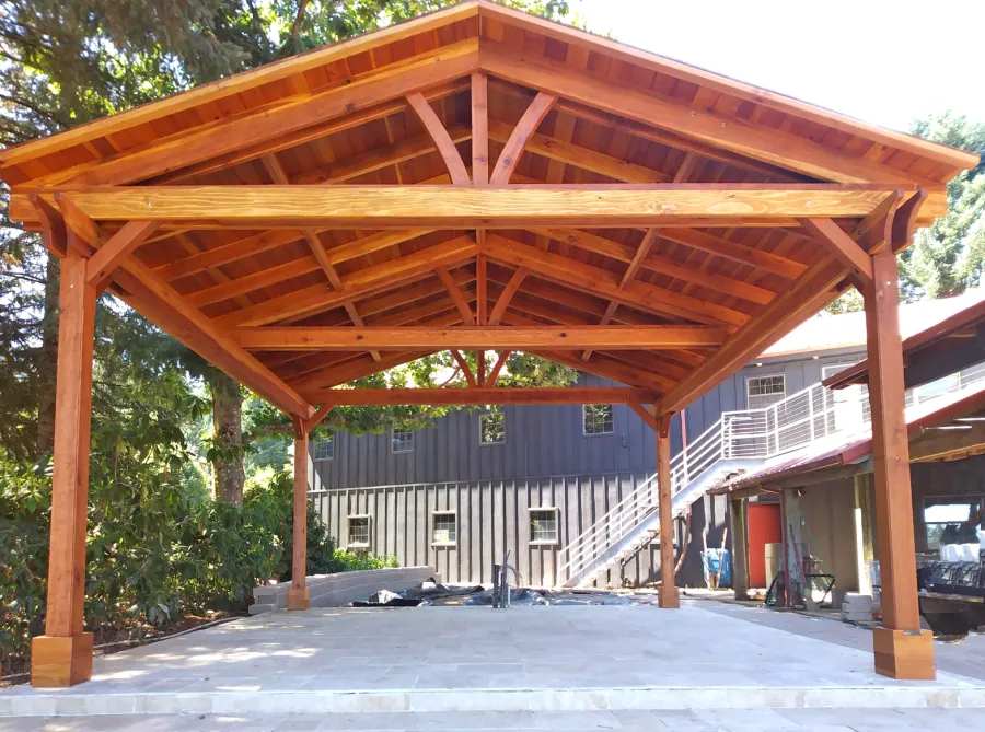 Del Norte Outdoor Kitchen Pavilion (Options: 20' L x 18' W, California Redwood, 4-Post Kit for High-Wind, No Ceiling Fan Base, No Electrical Wiring Trim Kit, Transparent Premium Sealant). Photo Courtesy of N. Littleton of Sherwood, OR.