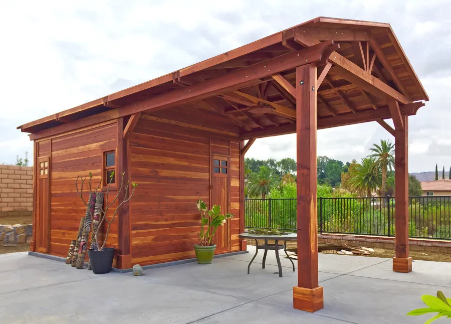 Custom Del Norte Outdoor Kitchen Pavilion with enclosed bathroom and front "porch area" (Options: 28' L x 14' W, California Redwood, 6-Post Anchor Kit for High-Wind, No Ceiling Fan Base, Electrical Wiring Trim Kit for 1 Post, Transparent Premium Sealant). Photo Courtesy of C. Nelson of Riverside, CA. Final roofing skin (composite shingles) was added a few days after these pictures were taken.