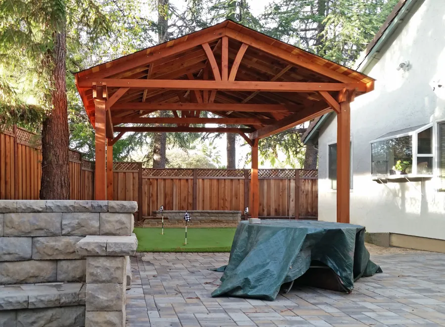 Del Norte Outdoor Kitchen Pavilion (Options: 26' L x 18' W, California Redwood, 4-Post Anchor Kit for High-Wind, 1 Ceiling Fan Base, Transparent Premium Sealant). Photo Courtesy of Scott Carper of San Jose, CA.