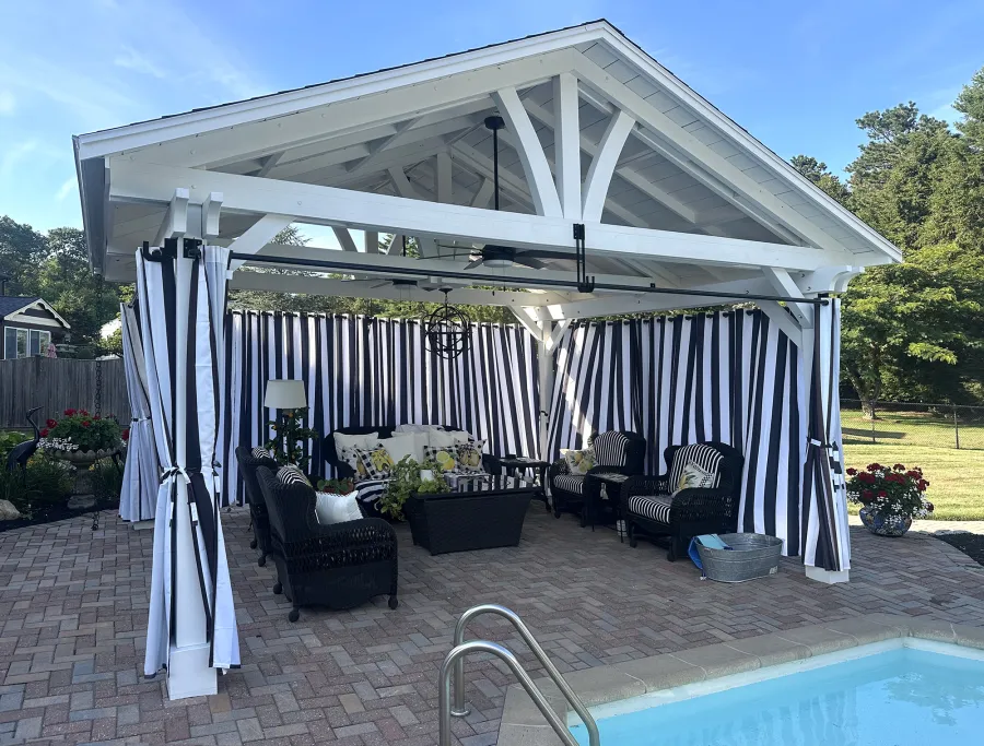 Del Norte Outdoor Kitchen Pavilion (Options: 15' L x 18' W, Mosaic Douglas-Fir, 4-Post Anchor Kit for Concrete, 9.5' H Posts, 1 Ceiling Fan Base, 1 Electrical Wiring Trim Kit, 4 Curtain Rods, White Stain Premium Sealant). Photo Courtesy of S. Leonard of Easton, MA.
