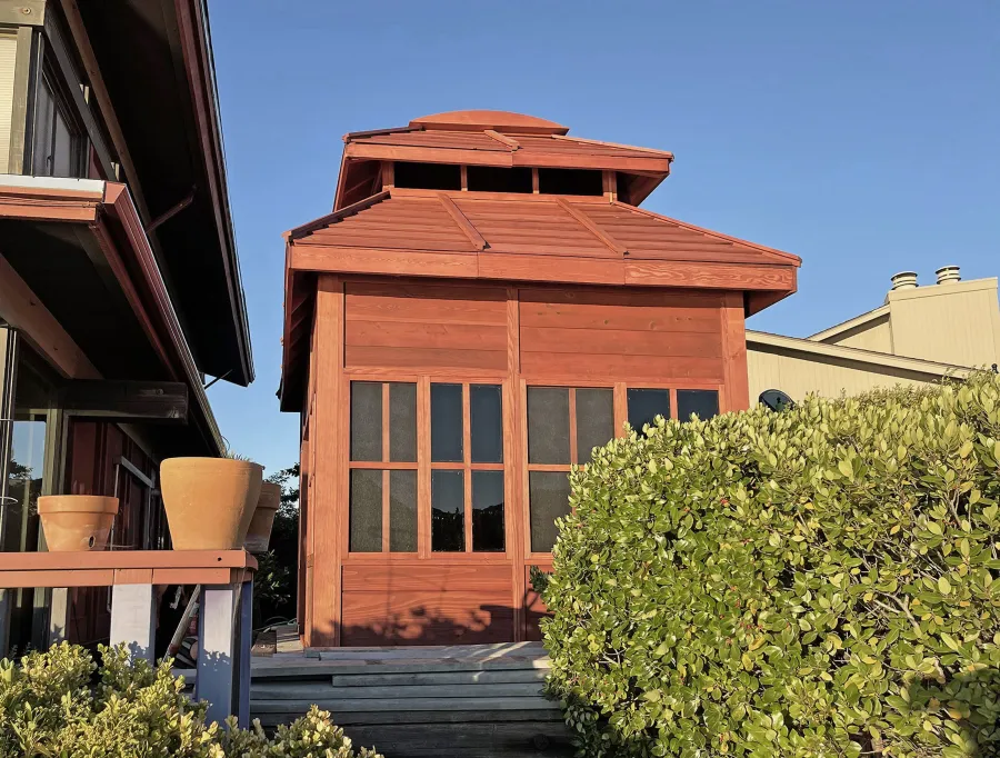 Dream Gazebos (Options: 9 ft Wall Height, 10' L, 14' W, Douglas-fir, All Sliding Windows with Screens, 4' x 6' Skylight, 36" H Siding Below Windows, Horizontal Siding, Japanese Doors with Screens, Complete Floor, Shiplap Roof, Cherry Stain Premium Sealant). Photo Courtesy of B. Victor of Larkspur, California.