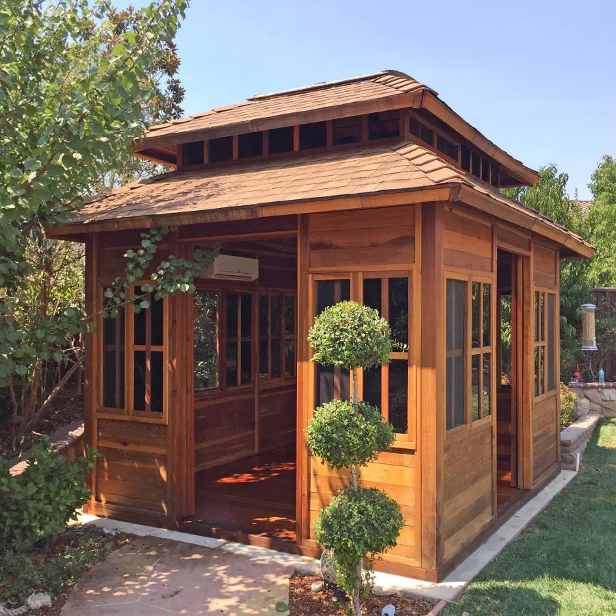 Dream Gazebos (Options: 7ft Wall Height, 10' L, 12' W, California Redwood, All Sliding Windows with Screens, 4' x 4' Skylight, 30" H Siding Below Windows, Horizontal Siding, Japanese Doors, Complete Floor, Set of Shingles, Transparent Premium Sealant). Photo Courtesy of Yvonne Bannister of Morgan Hill, CA