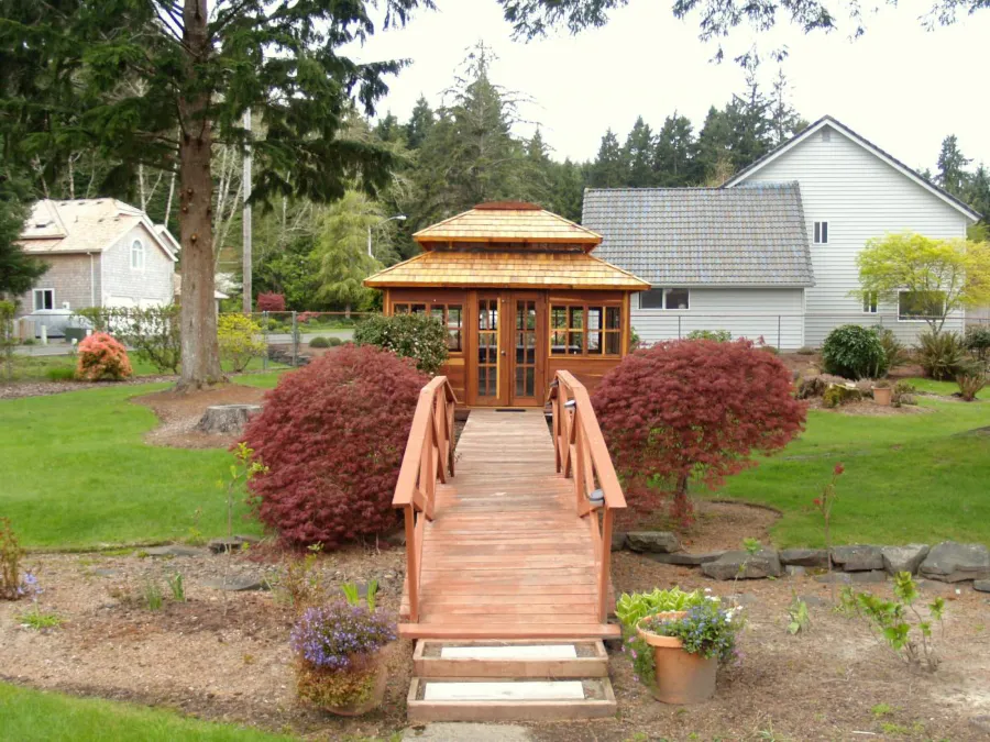 Dream Gazebos (Options: 7ft Wall Height, 14' L, 14' W, California Redwood, All Sliding Windows with Screens, 4' x 4' Skylight, 24" H Siding Below Windows, Horizontal Siding, French Doors, Complete Floor, Set of Shingles, Transparent Premium Sealant). Photo Courtesy of Mr. Randy Frank of Seaside, OR.
