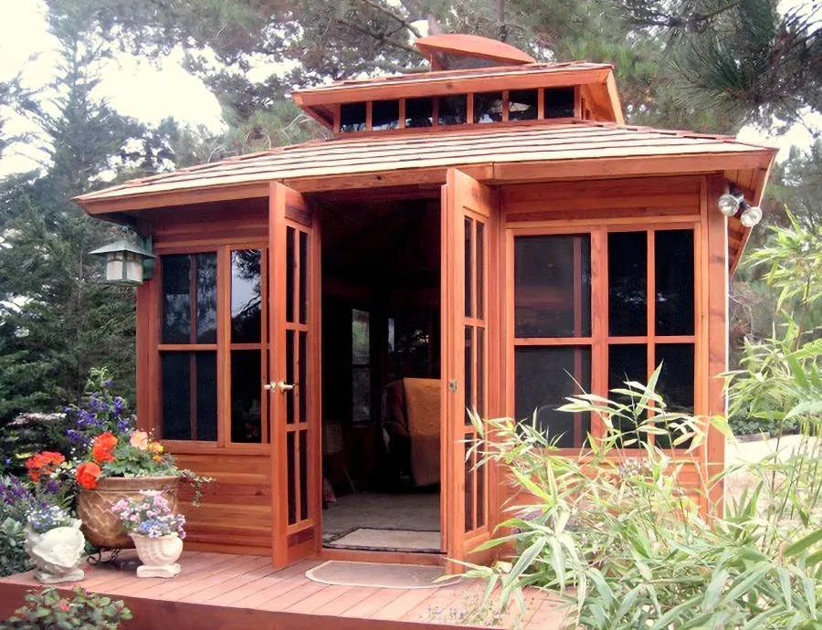 Dream Gazebos (Options: 7ft Wall Height, 14' L, 12' W, Mature Redwood, All Sliding Windows with Screens, 4' x 6' Skylight, 24" H Siding Below Windows, Horizontal Siding, French Doors, Complete Floor, Set of Shingles, Transparent Premium Sealant). Lighting not included.