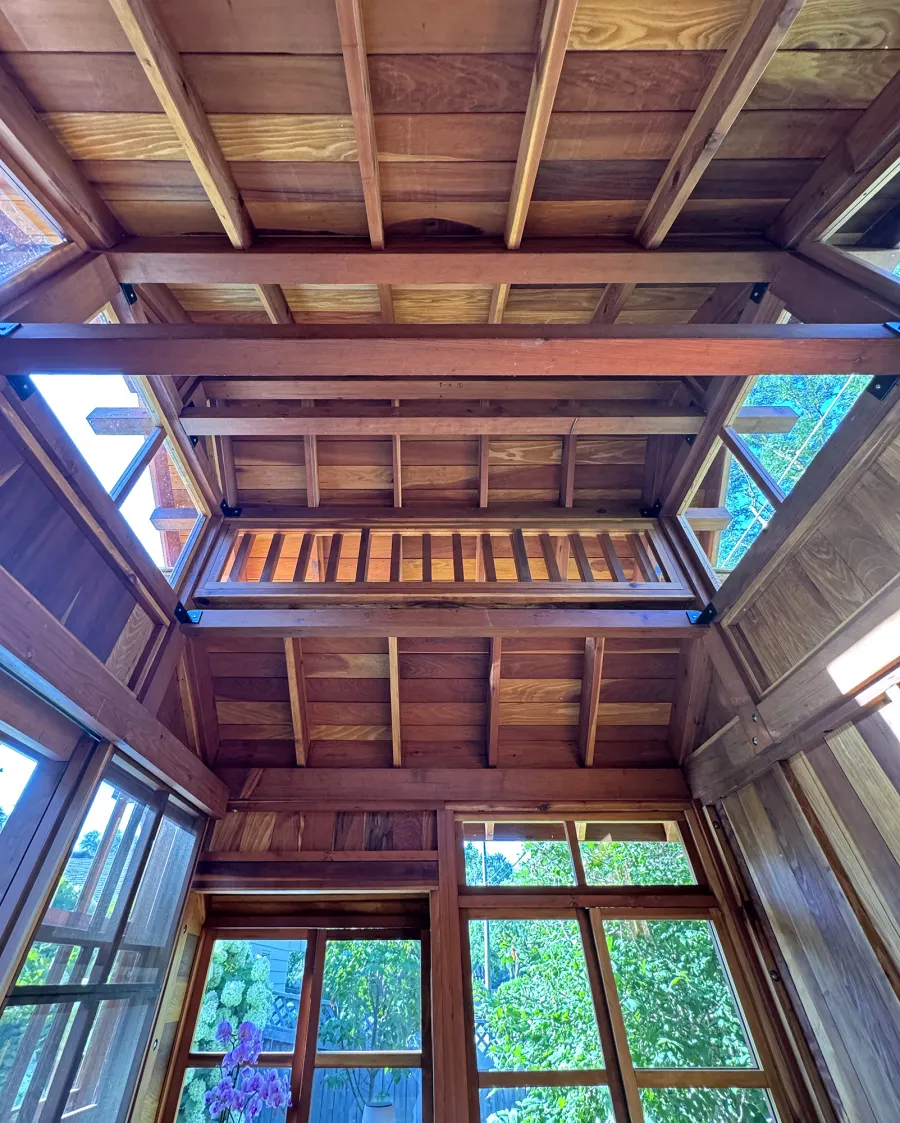 Custom Dream Gazebos (Options: 9 ft Wall Height, 10' L, 14' W, California Redwood, Combination of Sliding Windows with Screens and Fixed Windows, No Skylight, 36" H Siding Below Windows, Vertical Siding, Roof Pitch 8:12, Japanese Doors with Screens, No Floor [Installed on an Existing Deck], Shiplap Roof, Transparent Premium Sealant). Photo Courtesy of J. & R. Griess of Omaha, NE.