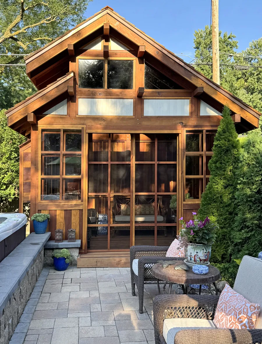Custom Dream Gazebos (Options: 9 ft Wall Height, 10' L, 14' W, California Redwood, Combination of Sliding Windows with Screens and Fixed Windows, No Skylight, 36" H Siding Below Windows, Vertical Siding, Roof Pitch 8:12, Japanese Doors with Screens, No Floor [Installed on an Existing Deck], Shiplap Roof, Transparent Premium Sealant). Photo Courtesy of J. & R. Griess of Omaha, NE.