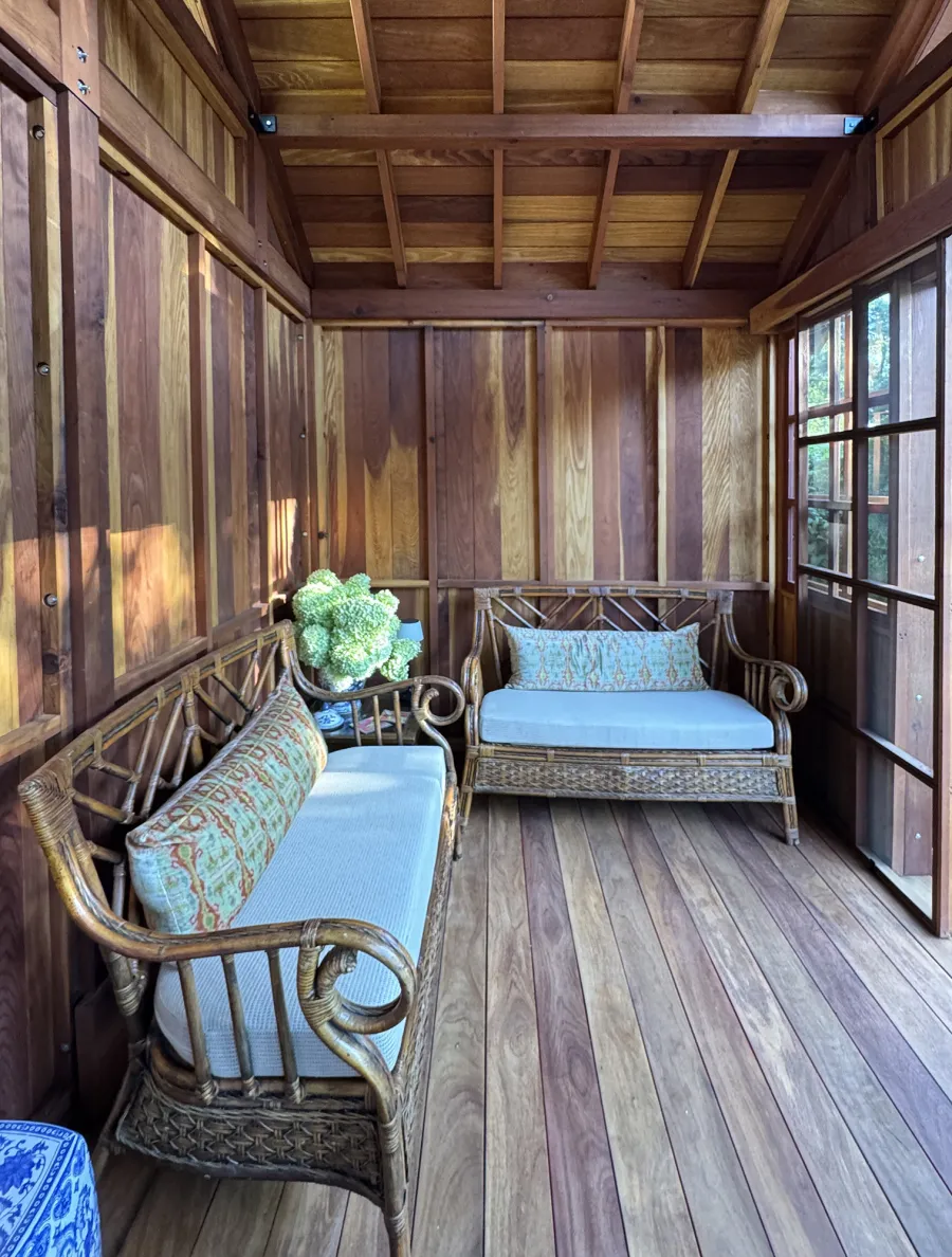 Custom Dream Gazebos (Options: 9 ft Wall Height, 10' L, 14' W, California Redwood, Combination of Sliding Windows with Screens and Fixed Windows, No Skylight, 36" H Siding Below Windows, Vertical Siding, Roof Pitch 8:12, Japanese Doors with Screens, No Floor [Installed on an Existing Deck], Shiplap Roof, Transparent Premium Sealant). Photo Courtesy of J. & R. Griess of Omaha, NE.