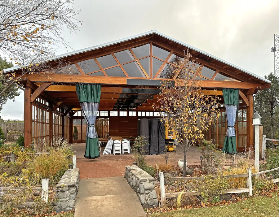 Custom El Paso Wedding Pavilion (Options: 50' L x 45' 6" W, California Redwood, 12' H Posts, 8-Post Anchor Kit for High-Wind, Transparent Premium Sealant). Custom sliding french doors and windows to enclose the structure were added by Forever Redwood during the design process. Photos Courtesy of T. Bruge of The Skyranch Lodge of Sedona, AZ.