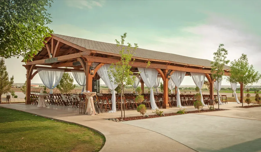 El Paso Wedding Pavilion (Options: 60' L x 30' W, Mature Redwood, 8-Post Anchor Kit for High-Wind, Transparent Premium Sealant). Photo Courtesy of Mr. & Ms. Rodriguez of El Paso Grace Gardens, 6701 Westside Dr. El Paso, Texas, 79932. We can build your Pavilion any size you need.