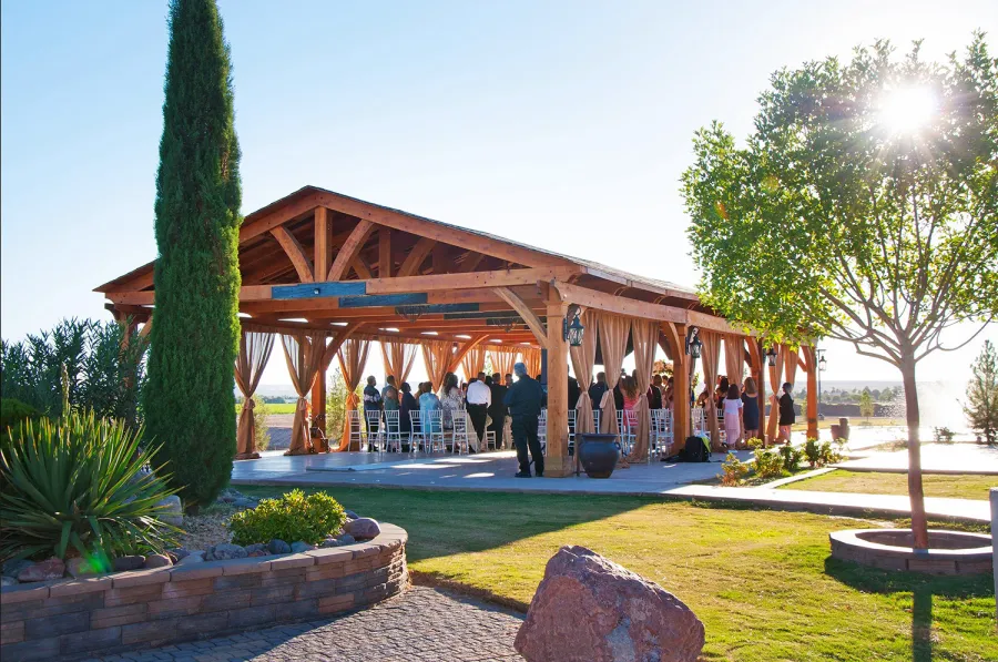El Paso Wedding Pavilion (Options: 60' L x 30' W, Mature Redwood, 8-Post Anchor Kit for High-Wind, Transparent Premium Sealant). Photo Courtesy of Mr. & Ms. Rodriguez of El Paso Grace Gardens, 6701 Westside Dr. El Paso, Texas, 79932. We can build your Pavilion any size you need.