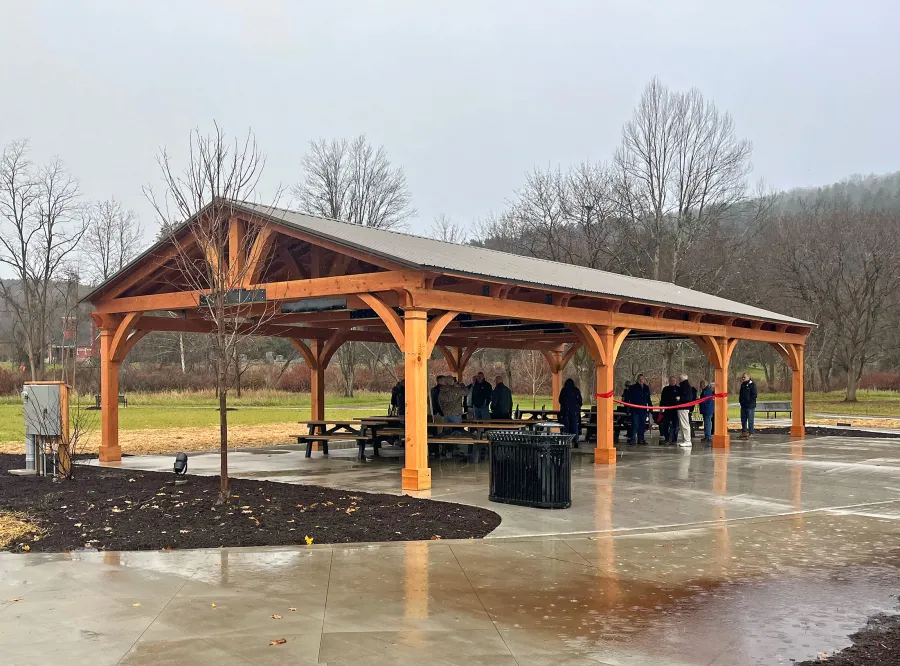 El Paso Wedding Pavilion (Options: 60' L x 30' W, Douglas-Fir, Post Anchor Kit for High-Wind, 10x10 Posts, 10.5' H Posts, Electrical Wiring Trim Kit for 2 Posts, No Ceiling Fan Bases, with Fascia Boards, With Horizontal Post Decorative Trims, Transparent Premium Sealant). Photo Courtesy of M. Flanagan of Norwich, NY.