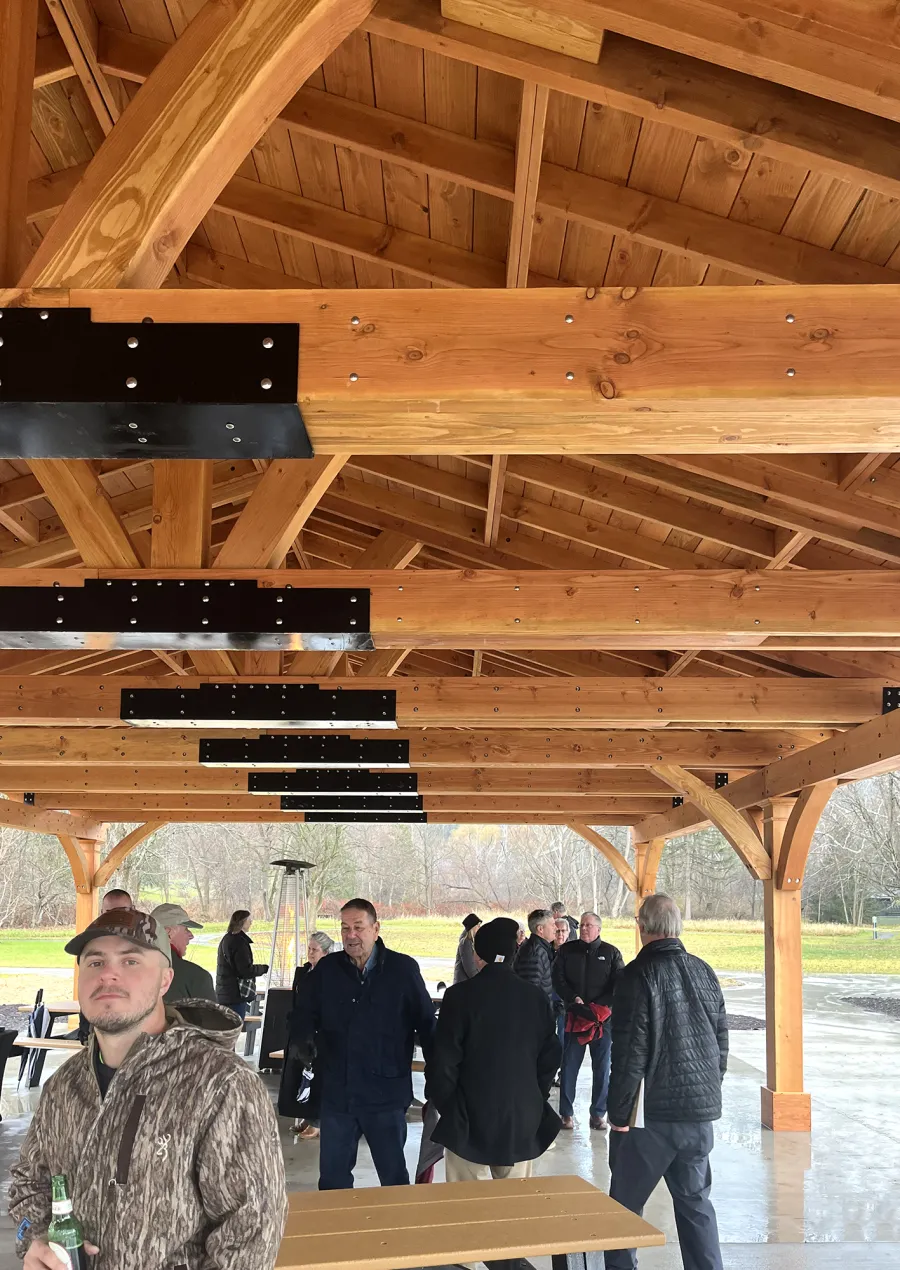 El Paso Wedding Pavilion (Options: 60' L x 30' W, Douglas-Fir, Post Anchor Kit for High-Wind, 10x10 Posts, 10.5' H Posts, Electrical Wiring Trim Kit for 2 Posts, No Ceiling Fan Bases, with Fascia Boards, With Horizontal Post Decorative Trims, Transparent Premium Sealant). Photo Courtesy of M. Flanagan of Norwich, NY.