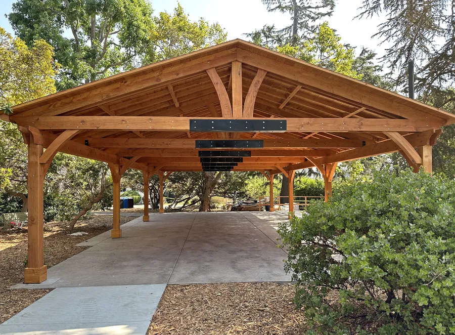 El Paso Wedding Pavilion (Options: 52'-7" x 26'-7", Douglas-Fir, 8-Post Anchor Kit for High-Wind, 8x8 Posts, 10' H Posts, Electrical Wiring Trim Kit for 4 Posts, with Ceiling Fan Base, with Fascia Boards, Transparent Premium Sealant). Photo Courtesy of J. Cooper of Oakland, CA.