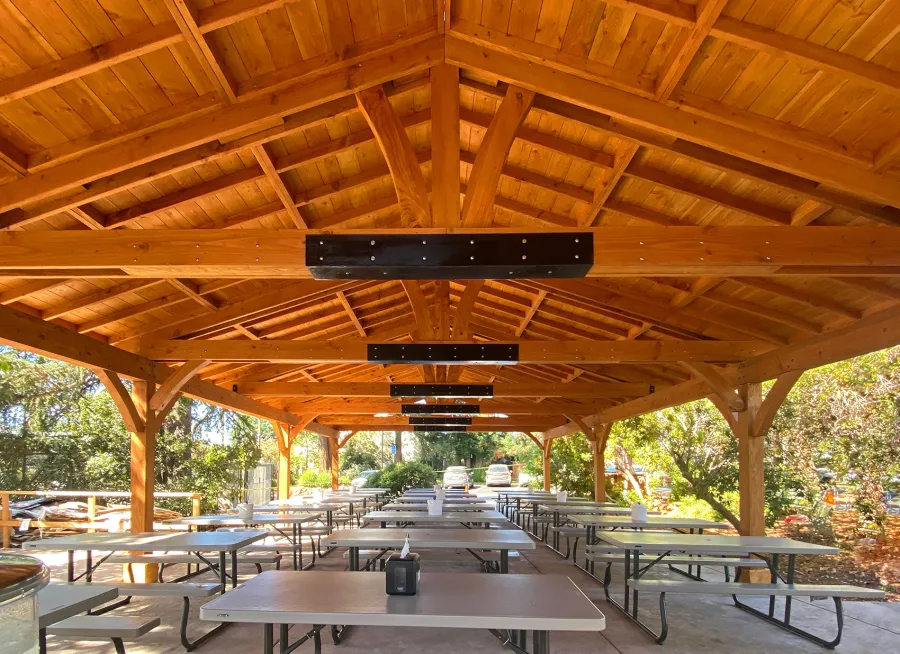 El Paso Wedding Pavilion (Options: 52'-7" x 26'-7", Douglas-Fir, 8-Post Anchor Kit for High-Wind, 8x8 Posts, 10' H Posts, Electrical Wiring Trim Kit for 4 Posts, with Ceiling Fan Base, with Fascia Boards, Transparent Premium Sealant). Photo Courtesy of Jennifer Cooper, Oakland Day School.