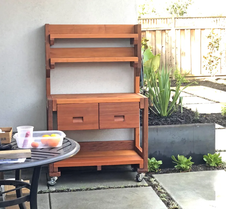 Eli's Redwood Potting Bench (Options: Standard Size, Mature Redwood, Casters, 2 Shelves, No Fold Down Sides, No Copper Inset, No Engraving, No Removable Lid, Transparent Premium Sealant). Photo Courtesy of B. Marinaro of Palo Alto, CA.