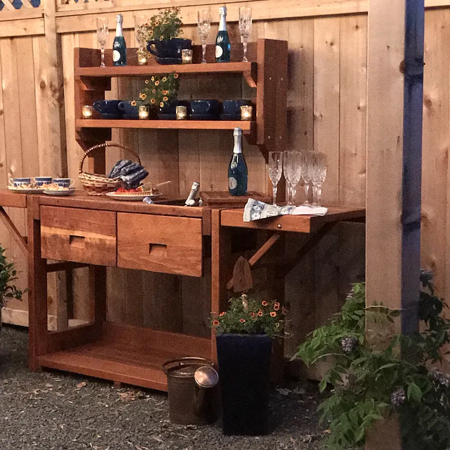 Eli's Redwood Potting Bench (Options: Large Size, California Redwood, No Casters, 2 Shelves, Both Sides Fold Down, Copper Inset for Right Drawer, No Engraving, Removable Slatted Lid Over Right Drawer, Transparent Premium Sealant). Photo Courtesy of M. Cooke of Westchester, IL.