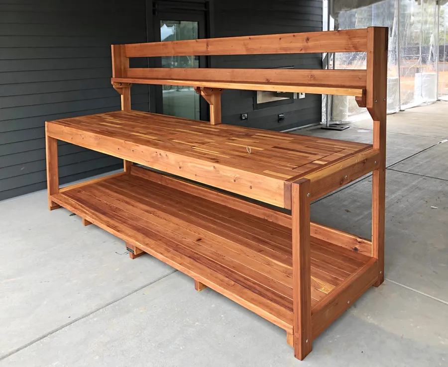 Custom Eli's Redwood Potting Bench (Options: 10' L x 36" W [Custom size], California Redwood, No Casters, One Shelf, No Drawers, No Fold Down Sides, No Engraving, No Lids, Transparent Premium Sealant). Photo Courtesy of B. Shanks of Salem, OR.