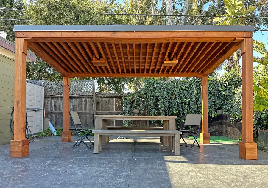 Emma's Modern Pavilion (Options: 8' x 15', No Privacy Panel, California Redwood, 8' H, 1 Electrical Wiring Trim, No Post Decorative Trim, 2 Ceiling Fan Bases [Ceiling Fan Bases Are Angled to Compensate for the Roof Pitch], No Curtain Rods, Transparent Premium Sealant). Photo Courtesy of C. Noa of San Mateo, CA.
