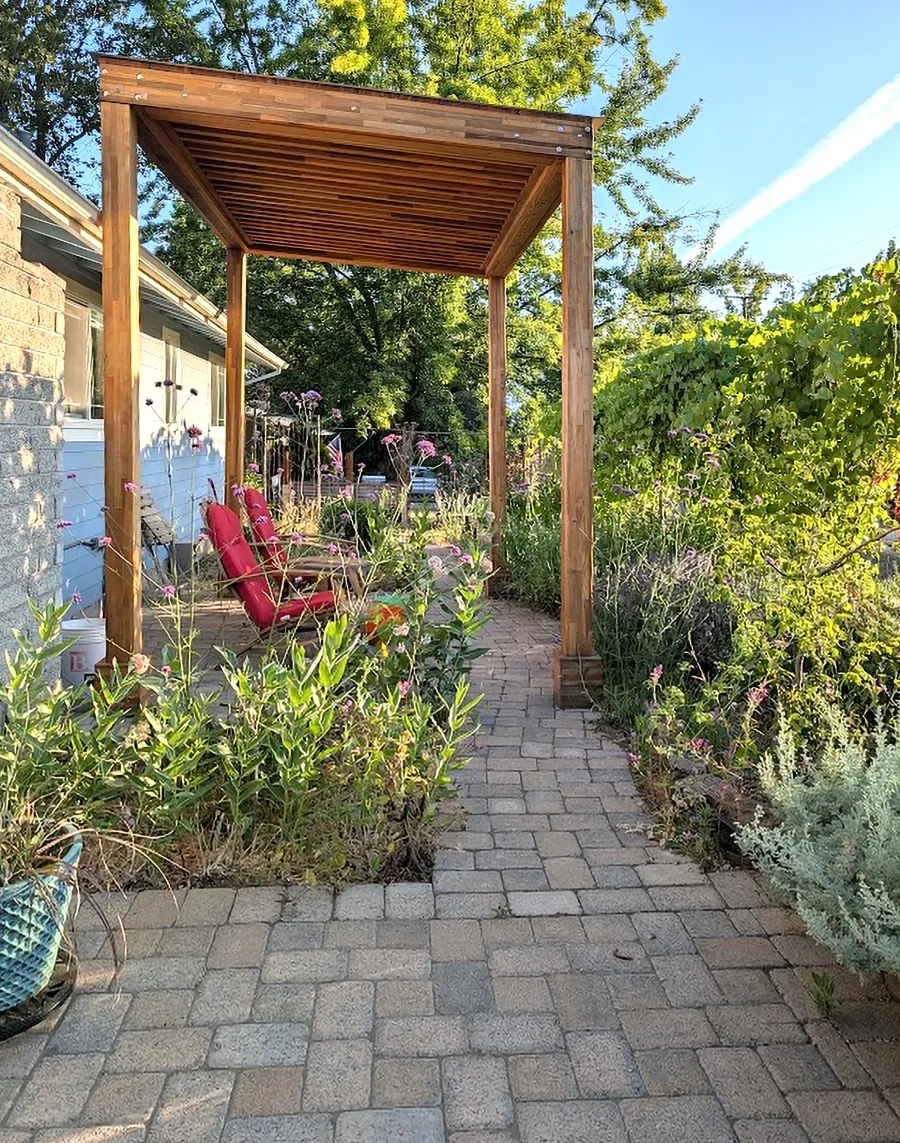 Emma's Modern Pavilion (Options: 8' x 12', No Privacy Panel, Mosaic Redwood, 10' H, 12:1 Slope, No Electrical Wiring Trim, No Post Decorative Trim,  Post Anchor Kit for High-Wind, Transparent Premium Sealant). Photo Courtesy of J. Kierstead of Ashland, OR.