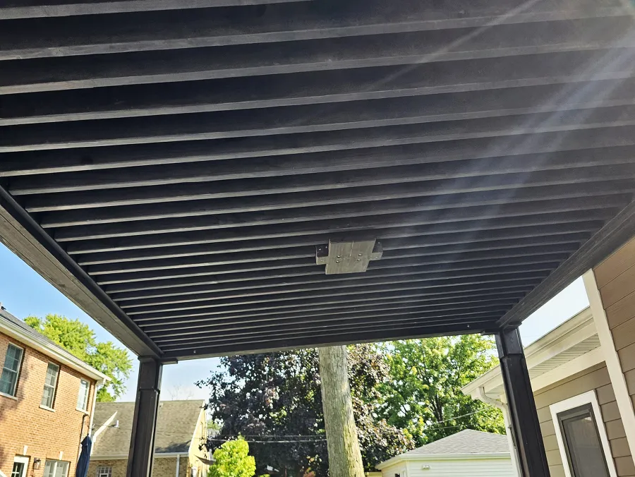 Emma's Modern Pavilion (Options: 12' x 14', No Privacy Panel, California Redwood, 9' H, Back Posts Wrapped in Masonry, 4 Electrical Wiring Trims, Vertical Post Decorative Trims, 1 Ceiling Fan Base, No Curtain Rods, Custom Finish [Wood Treatment Valhalla]). Photo Courtesy of P. Praxmarer of Chicago, IL.