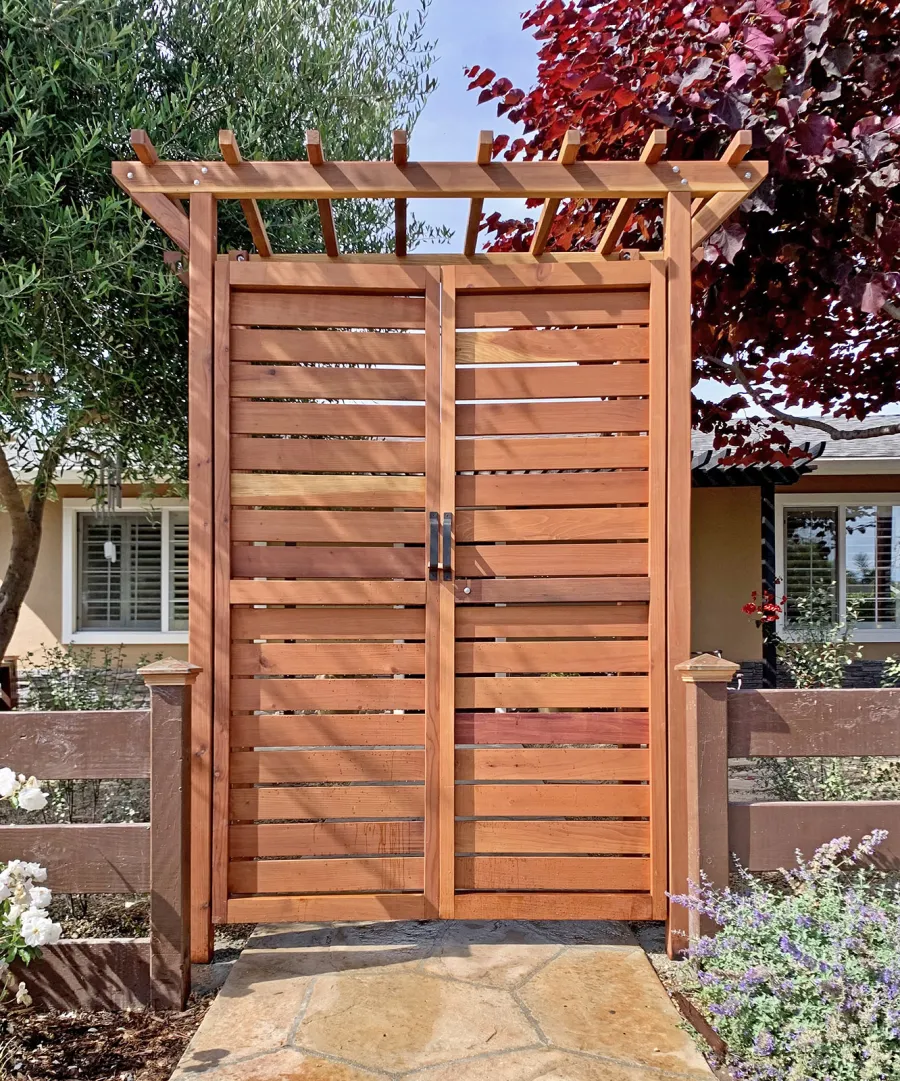Custom Entryway Arbor with Custom Gate insted of Panels (Options: 78" W, 36" D, California Redwood, Transparent Premium Sealant). Photo Courtesy of C. Albert of Carpinteria, California.